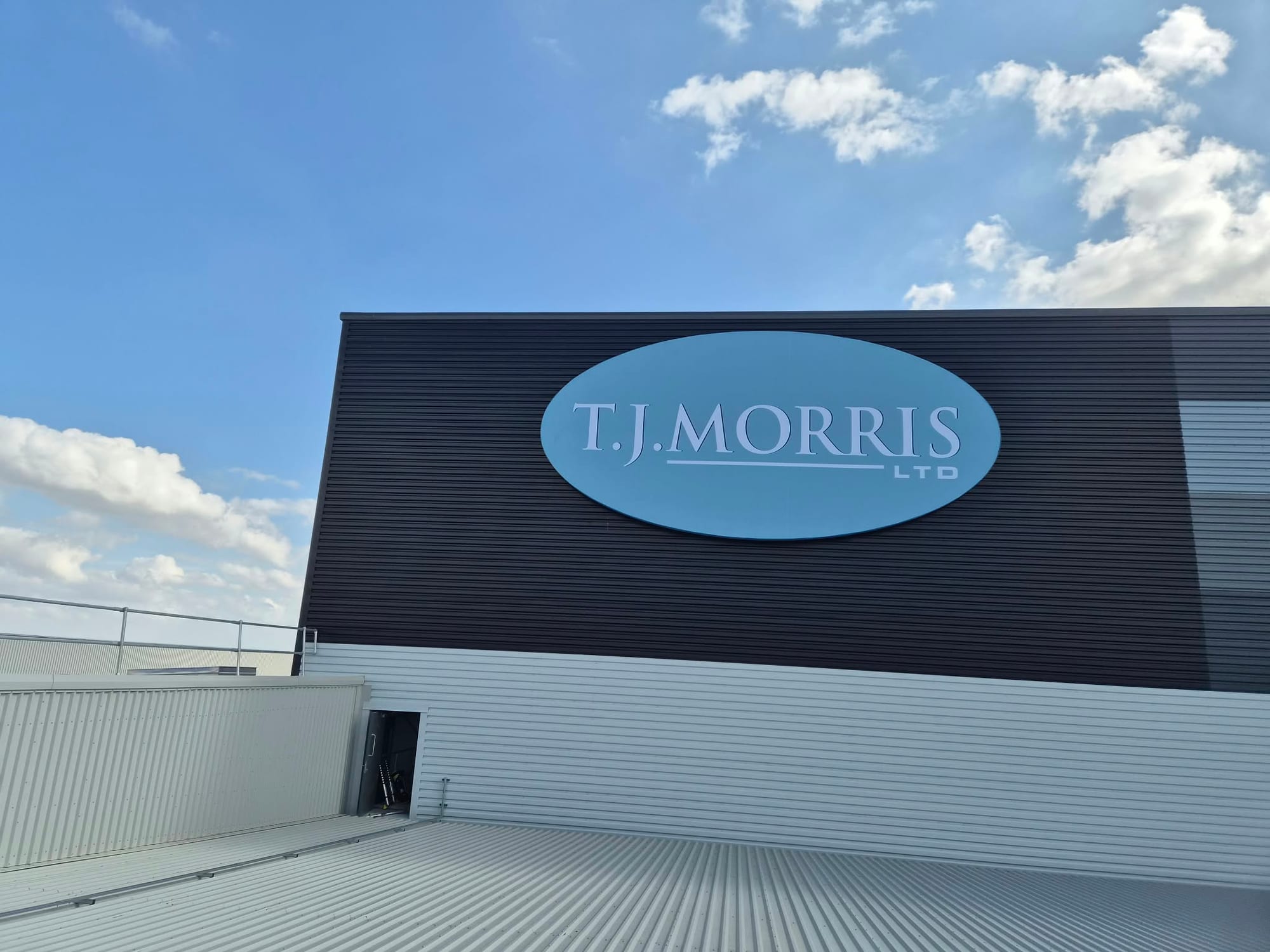 Home Bargains / TJ Morris Distribution Centre, Doncaster — completed tj morris circular sign