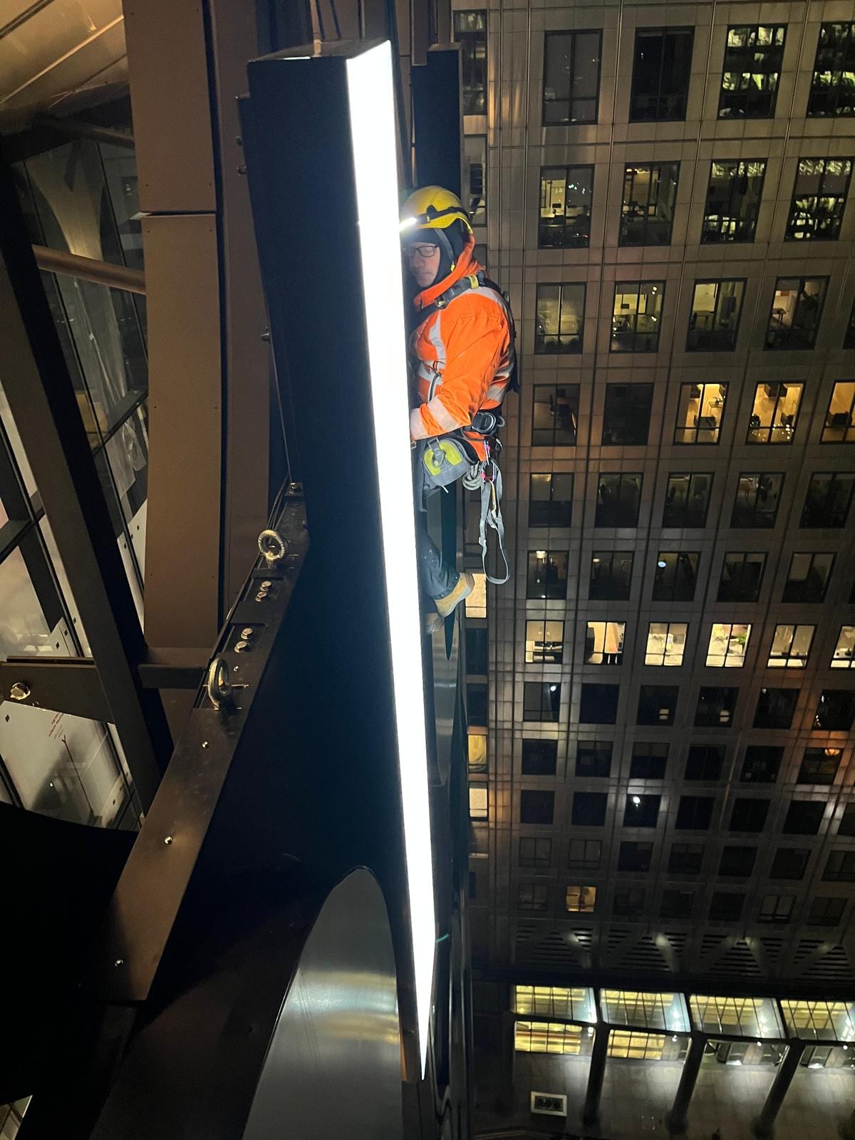 Revolut HQ, Canary Wharf — night rope access letter fixing