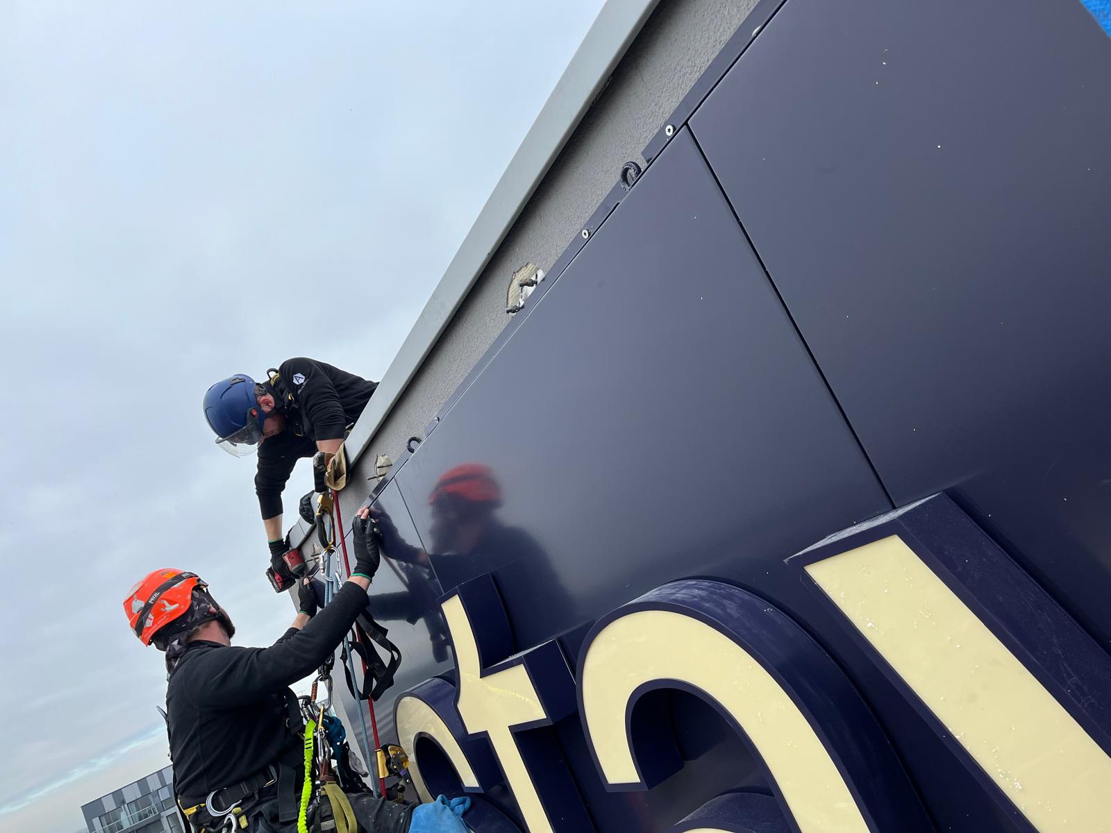 Staycity Aparthotels, London Heathrow — rope technicians at sign