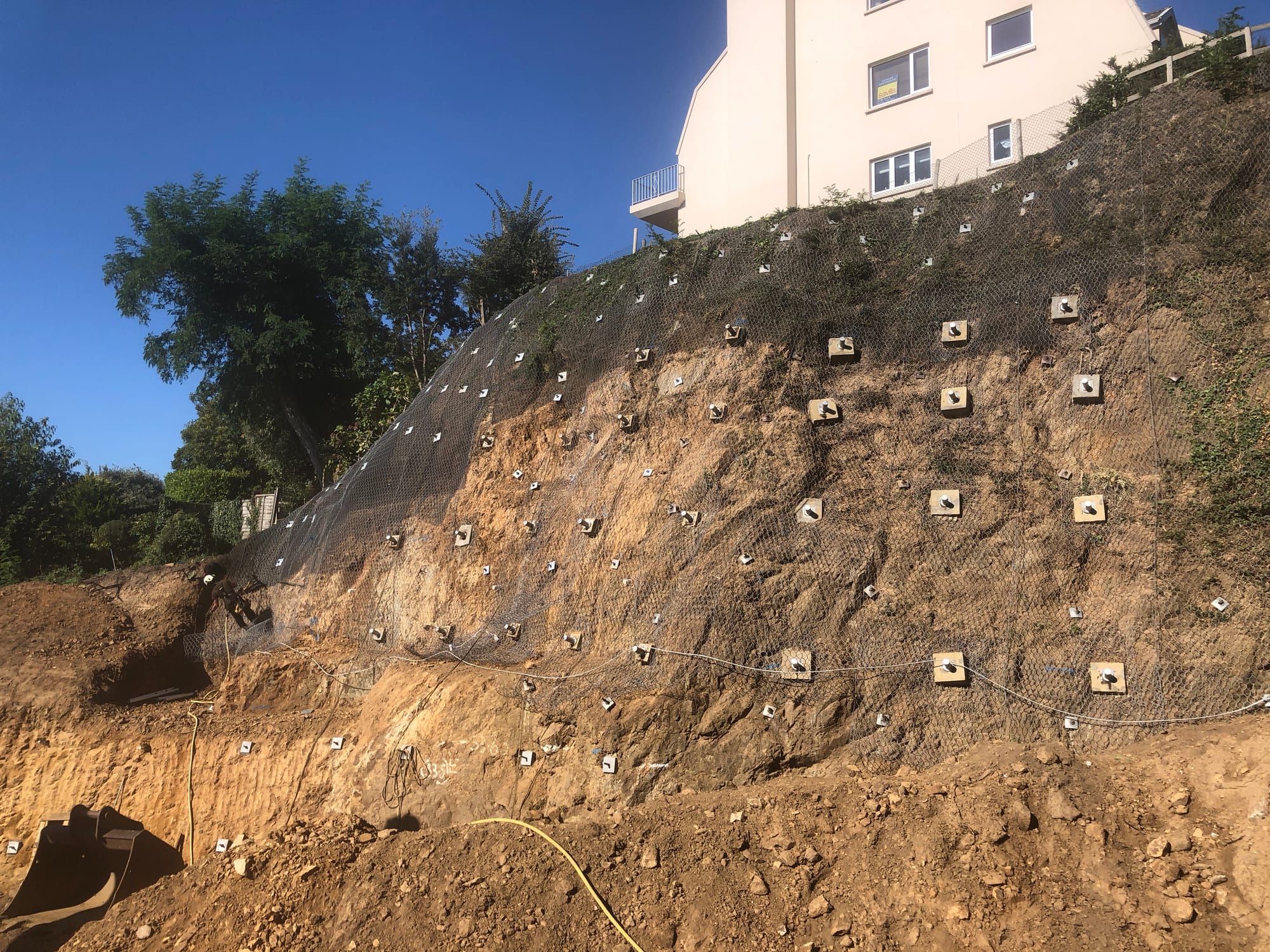 Geotechnical — soil nail grid below building
