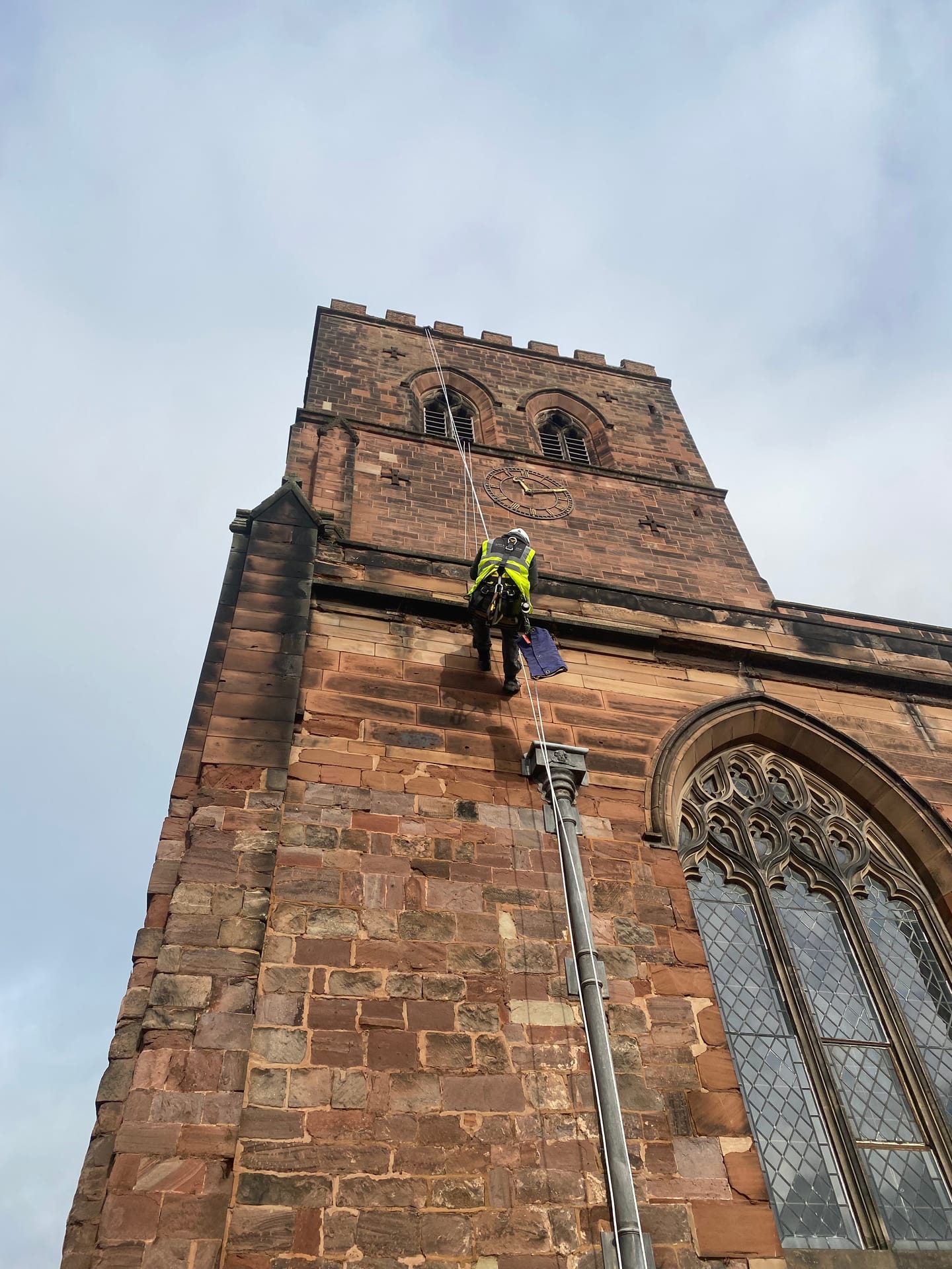 Rope Access conservation works at height — church tower stone repair