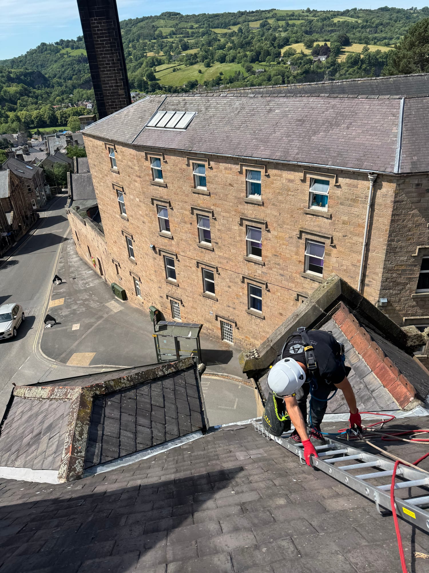 Rope access conservation — slate roof stone mill