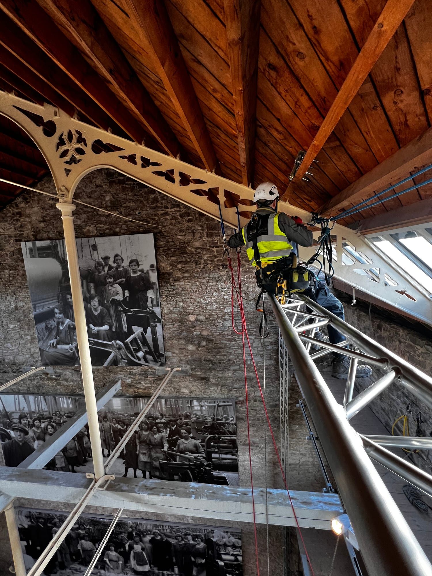 Rope access conservation — heritage roof truss interior