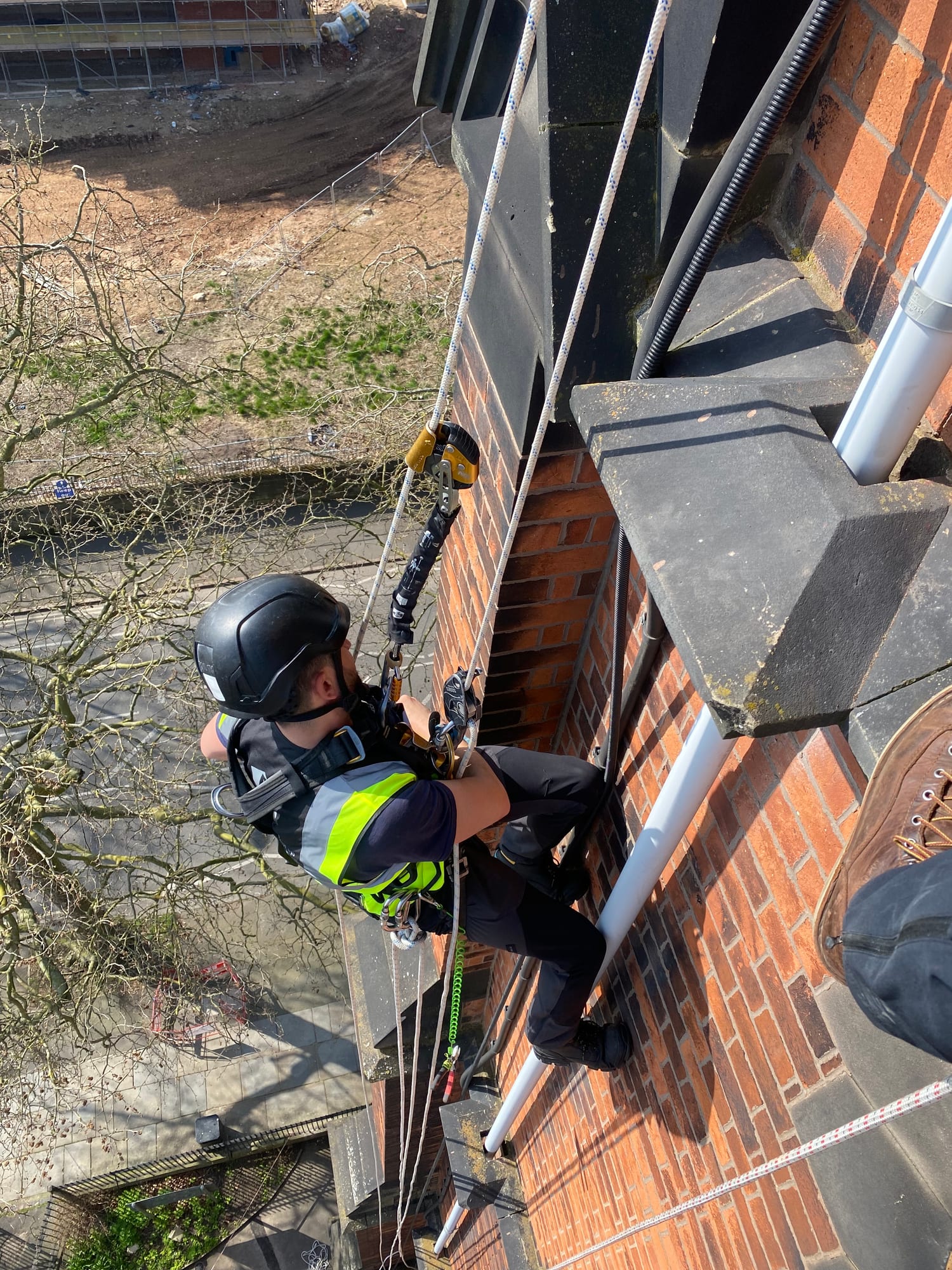 Rope access conservation — brickwork stone cill