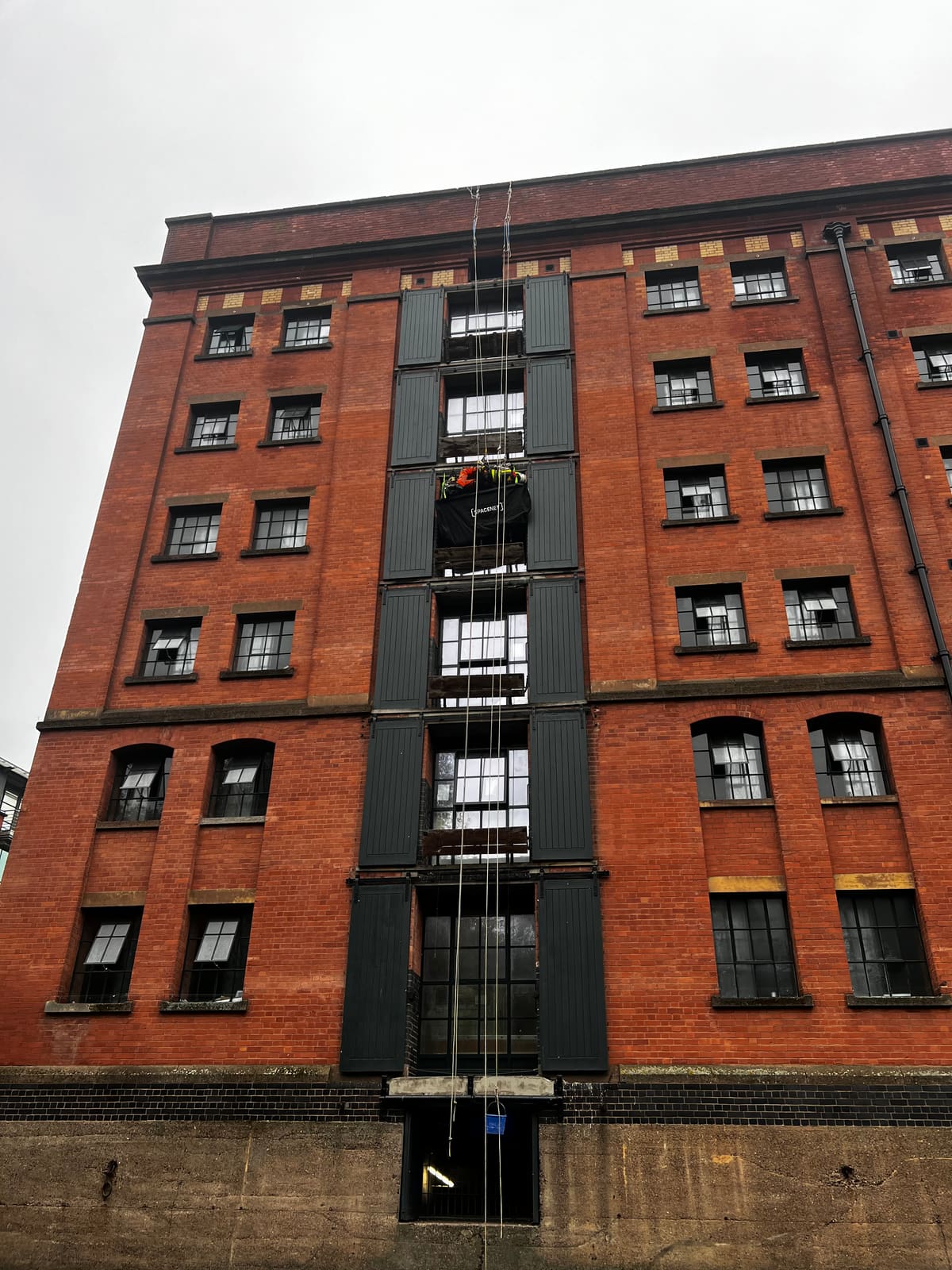 Rope Access construction works at height — mill scaffold