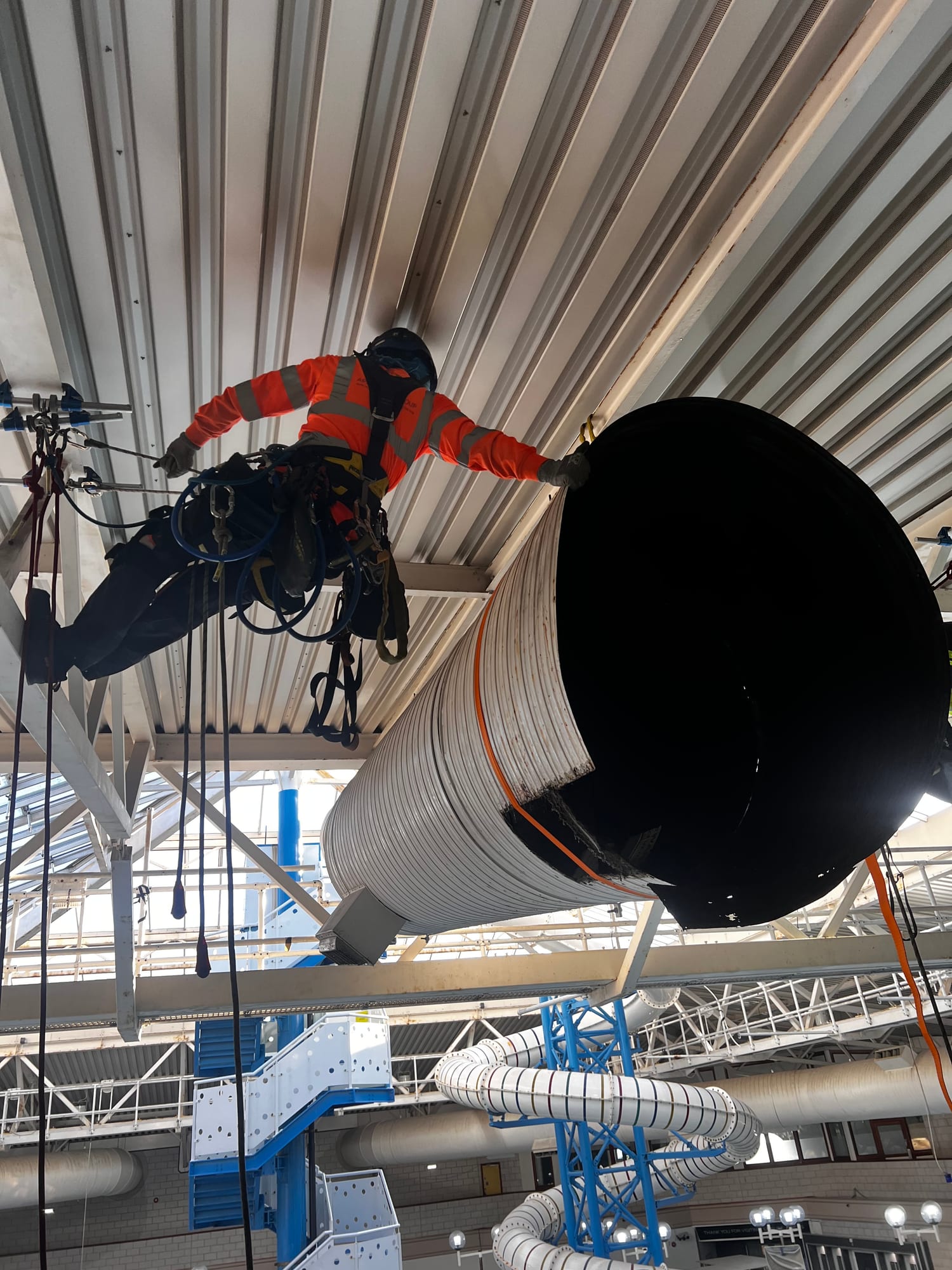 Rope access construction — atrium ductwork