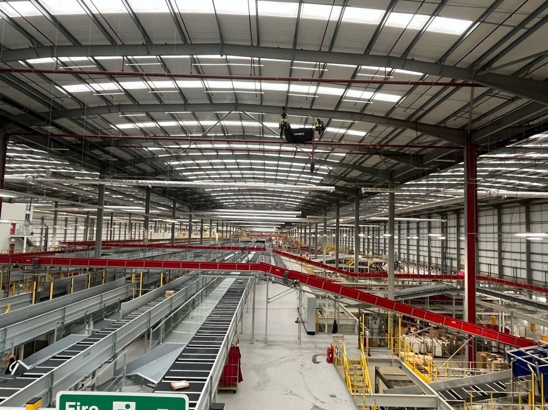 Rope Access fire protection works at height — warehouse wide
