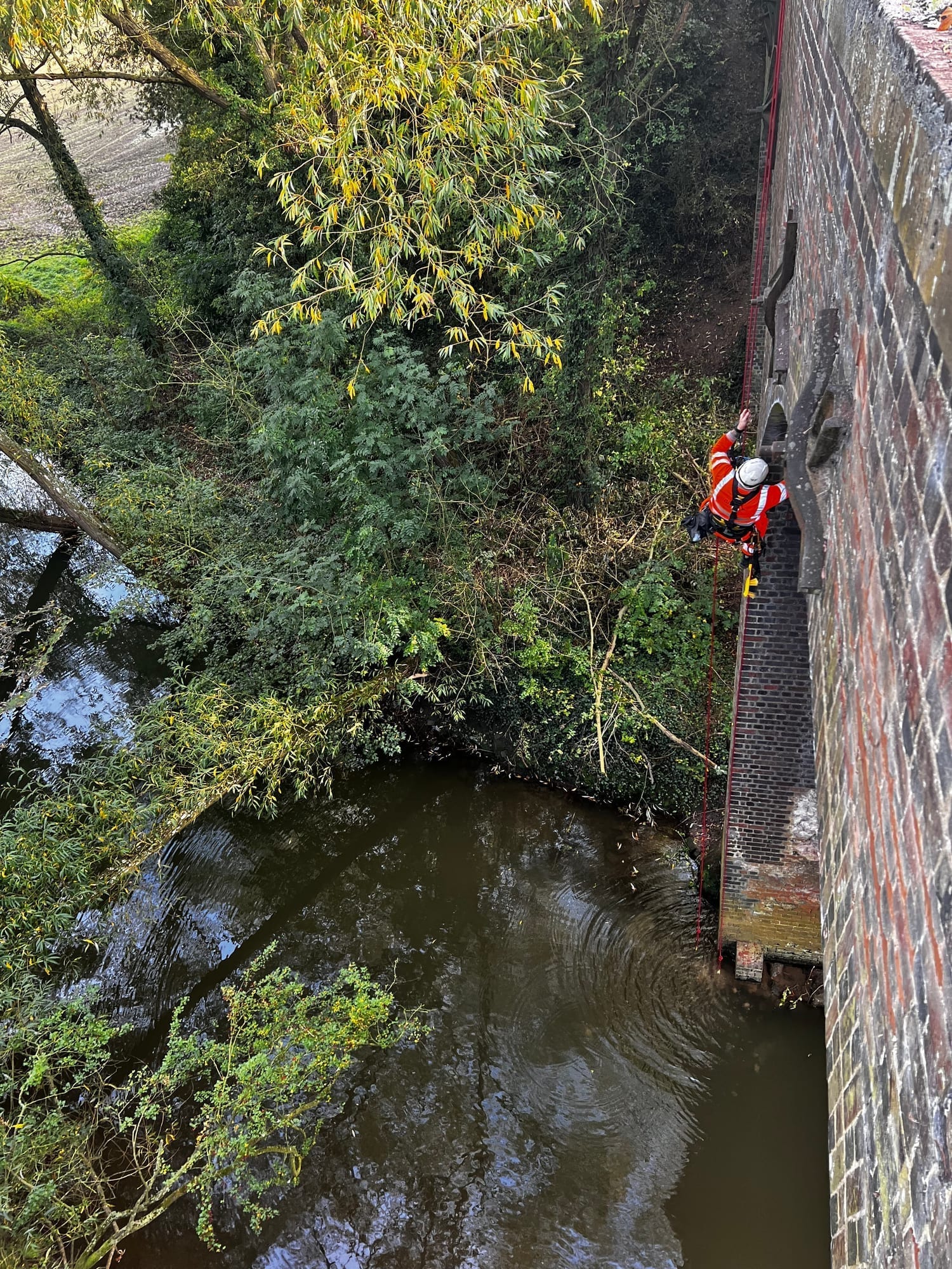 Rope access road & rail — brick bridge abutment river