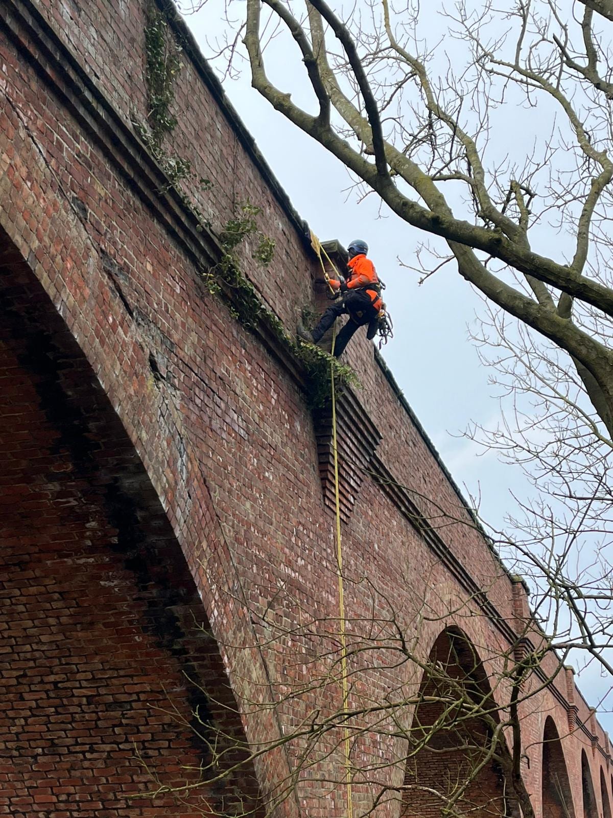 Rope access road & rail — brick viaduct arch