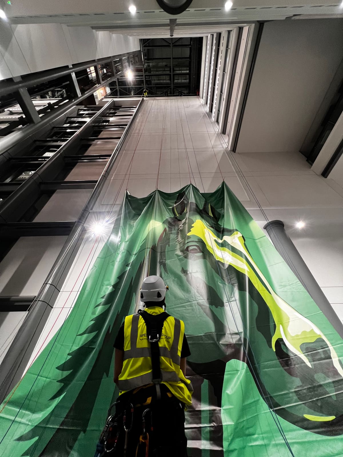 Rope Access signage & display works at height — atrium graphic